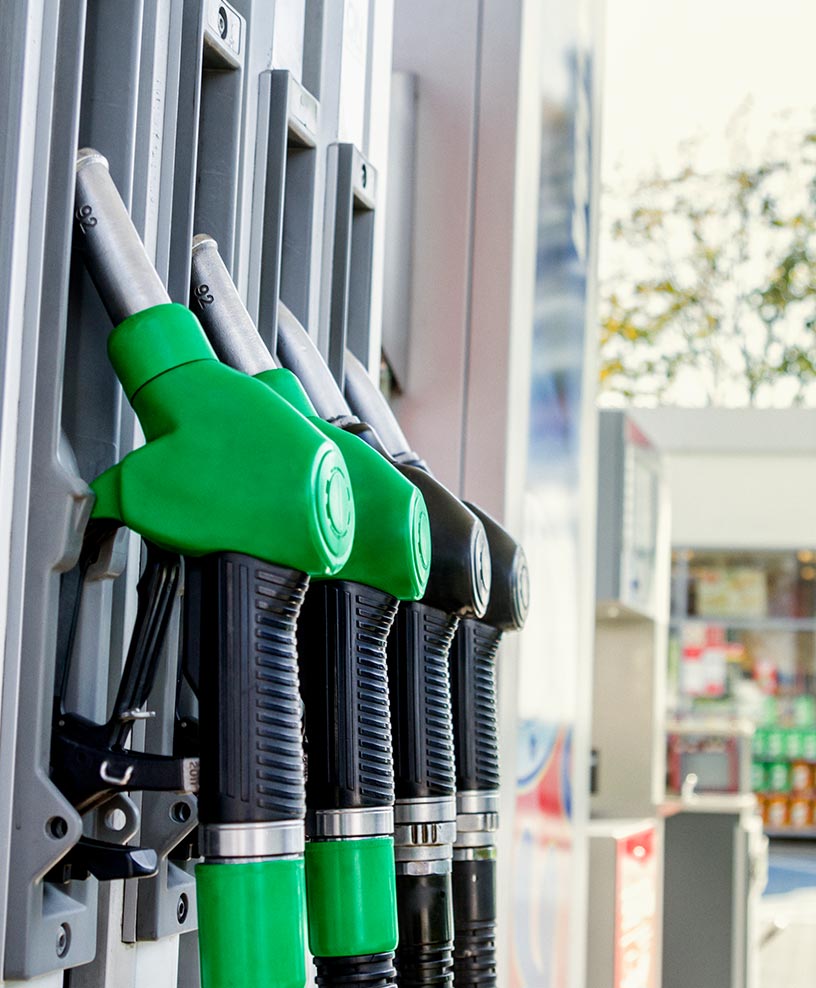 Gas pump nozzles at a fuel station